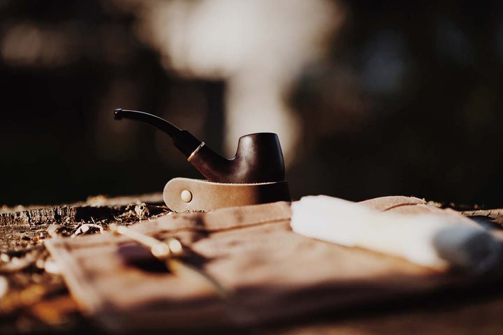 Tobacco pipe on table
